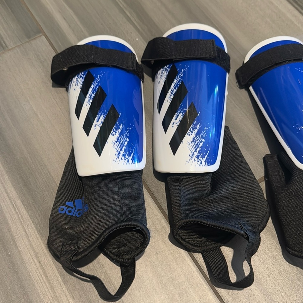 Adidas shinguards worn only a few times size youth large for age 9-10.